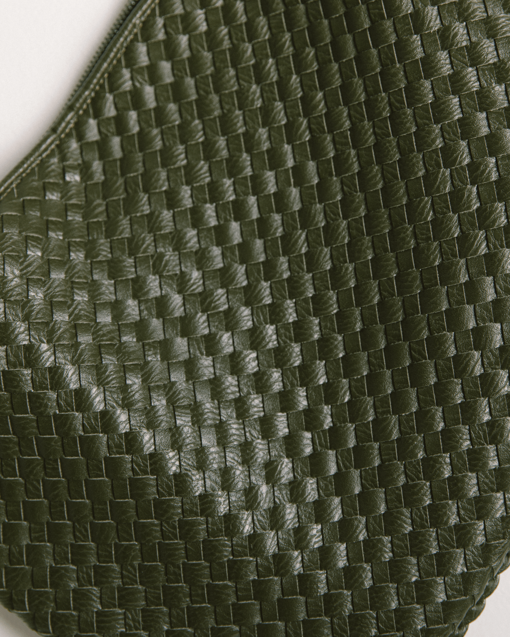 Close-up of a green woven fabric texture