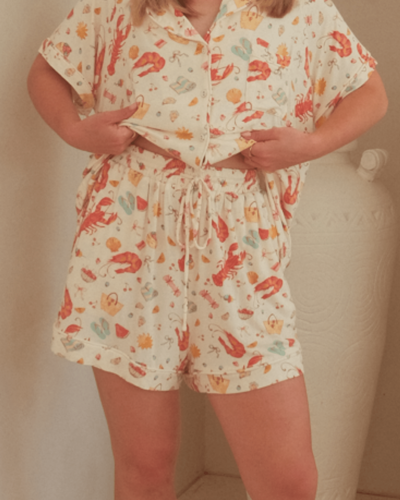 Person wearing a Australia Christmas printed matching PJs.