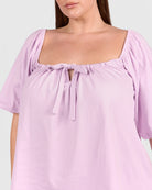 Details of breastfeeding access maternity friendly shirt. 