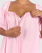 Women wearing breastfeeding friendly cotton pj shirt