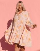 Woman wearing flowy and breathable dress. 