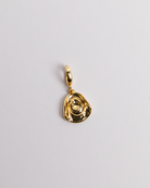 A gold-plated cowgirl hat charm with a loop clasp on a white background.