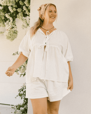 Matilda Shorts in White – Oversized maternity and postpartum lounge shorts with an elastic waistband.